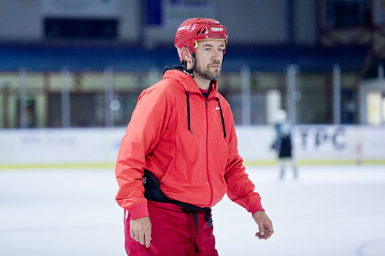 An instructor at the Learn to Skate hockey school.