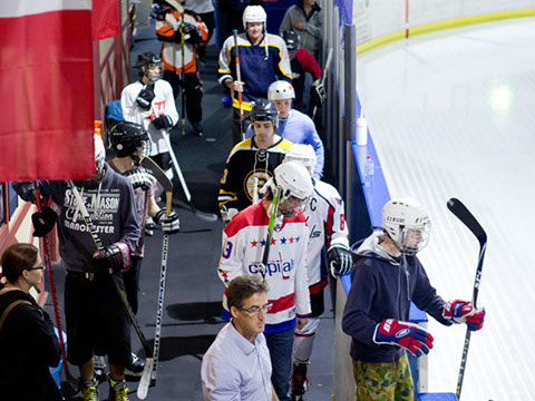 Participants receiving instruction at the Learn to Play hockey school.